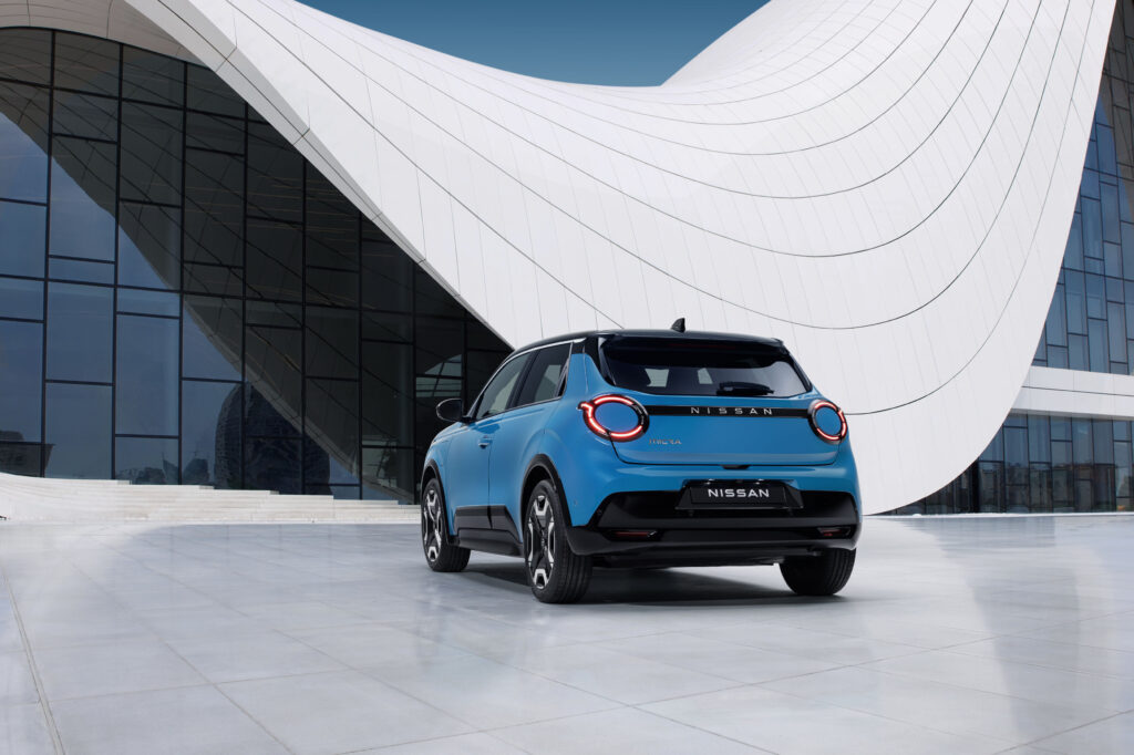 New Micra In Blue Gear Color In Front Of A White